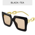 Gafas de sol negras cuadradas con patillas de cadena dorada y lentes marrones BLACK-TEA - Montura Negra Lentes de Té