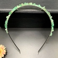 Macro detail of handmade silver headband with green raw crystal stones wire-wrapped firmly - Green Aventurine + Silver Band
