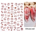 Détail macro de stickers pour ongles rose et cœur dorés rouges sur une manucure - CB-200 Rose Lèvres Lettre Style (CB-200) / Rouge