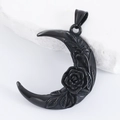 Macro detail of black crescent moon pendant with rose and leaf embossing on white stone - Pendant Only / Black