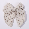 Floral print cream hair bow clip made of linen cotton fabric for girls and toddlers - Beige Floral