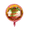 Detail of round foil balloon with cake design and Feliz Cumpleaños Spanish greeting - Orange Background Cake Spanish Happy Birthday Balloon