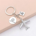 Travel keychain detail featuring airplane charm and engraved passport and motto tags - 6#-Airplane Passport English Tag
