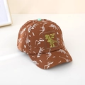 Detail der braunen Kinder-Basecap mit Dino-Skelett-Prints und T-Rex-Aufnäher - 52CM(2-6 Jahre) / Dunkelbraun