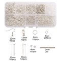 Macro view of DIY jewelry making kit with silver earring hooks, jump rings and chains - 10-Grid Silver Earring Findings Box