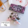 Superweiches Katzenpfoten-Quetschspielzeug in Schwarz-Rosa mit Plüschkugel - Schwarz-Rosa Katzenpfote