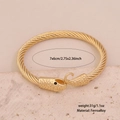 Goldener Ferroalloy Schlangenarmreif mit 7x6cm Maßen und einem Gewicht von 31g - Armband