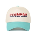 Close-up of high-quality embroidery detail on a two-tone cotton baseball cap with text - Lake Blue
