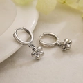 Elegant silver flower drop earrings with sparkling zircon crystals on white porcelain - Flower/44466 / Silver