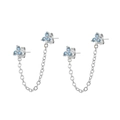 Macro detail of silver floral chain earrings with light blue cubic zirconia stones - Silver/Light Blue Zirconia