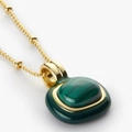 Detailed close-up of 18k gold-plated necklace with a green malachite pendant on white background - Malachite Necklace / 48cm