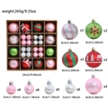 Pink and red Christmas ball ornaments with festive glitter patterns in a storage box - Pink