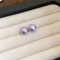 Elegant purple round pearl stud earrings in a beige linen jewelry display box - Oval Style (Diameter 10mm) / Purple