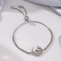 Detail of silver star and moon tassel bracelet with cubic zirconia and box chain - Star & Moon / Silver
