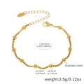 Goldenes Edelstahl-Perlenarmband mit abwechselnden runden Perlen und Hummerverschluss - Goldenes Kettenarmband