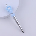Dettaglio penna con perline argento e fiore in silicone blu con accenti sfaccettati - Blu