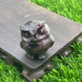 Hand-carved 3.5cm natural red jasper owl figurine on a rustic wooden base - Garnet