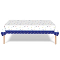 Détail de la nappe de fête dinosaure avec étoiles colorées et empreintes de dinosaures - 130*220cm / Empreinte de Dinosaure