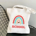White canvas tote bag with rainbow heart print and Happy Last Day of School text - Happy Last Day of School