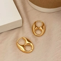 Chunky gold C-shaped hoop earrings with irregular textured design and polished finish - Gold Pig Nose (A-906)