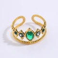 Elegant gold titanium steel ring featuring green oval gems with adjustable open band design - Crown Emerald Style (JZ24-1)