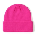 Detailed view of bright pink knitted baby beanie showing soft wool texture - Rose Red