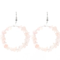 Macro detail of large hoop earrings featuring natural pink crystal gravel and silver hooks - Rose Quartz