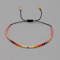 Pulsera Miyuki bohemia con cuentas geométricas de colores y cordón negro ajustable a mano - Cuentas Brillantes Múltiples/Cordón Negro