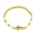 Bracciale di perline dorate con perle bianche e ciondolo a croce in zircone verde - Verde