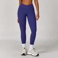 Pantaloni da yoga viola scuro a vita alta incrociata con tessuto effetto nudo - S / Blu Rosato