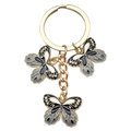 Golden keychain featuring three elegant enamel butterfly pendants in black, grey and white - Black Butterfly (ER715)