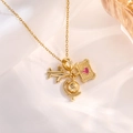 Detailed shot of golden travel necklace featuring airplane, globe, and heart suitcase charms - Silver Airplane Earth Style