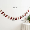 Weihnachtsgirlande aus Wollfilz mit rot-schwarzen Karosocken und weißem Schriftzug - Socken Banner