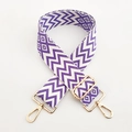 Detail of adjustable 5cm purple and white zigzag woven strap with gold metal swivel hooks - Gold Buckle / Purple
