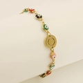 Gold Evil Eye bracelet featuring colorful enamel beads and a central round charm - Letter O