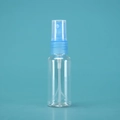 Transparent plastic spray bottle with a blue pump head and clear cap on cyan background - 30ml / Transparent Bottle Blue Spray