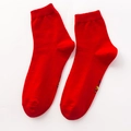 Vibrant red crew socks with yellow cartoon embroidery made of breathable cotton fabric - Crew / Red