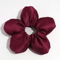 Detail of burgundy satin oversized flower scrunchie with glossy silk-like texture and 3D design - Wine Red (Approx. 18cm)