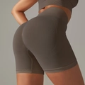 Detail of seamless dark gray high-waisted shorts with ribbed waistband and scrunch butt effect - S / Bottoms / Brown