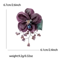 Elegant purple lace flower brooch with bead tassels and dimensions 6.1cm by 6.7cm - Purple