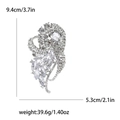 Silver vintage phoenix brooch with sparkling rhinestones and detailed size measurements - Silver Base White