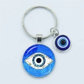 Blue Turkish evil eye keychain with silver alloy pendants and glass dome design - Glitter Glass Evil Eye