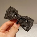Luxe black rhinestone bow hair clip with central 3D flower detail and dark gemstone finish - Style D Spring Clip / Black and Gray