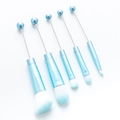 Light blue 5-piece DIY beaded makeup brush set with silver ferrules on white background - Morandi Blue