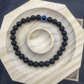Elastisches Armband aus 6mm schwarzem Lavastein mit blauer Evil Eye Perle für Herren - 6mm / Lavastein