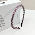 Elegant pink twisted headband adorned with sparkling rhinestones in a bohemian style - Pink Rhinestone