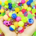 Mix of colorful starry and solid rubber bouncy balls in a bulk toy assortment - 25mm / Floating Mixed Ball