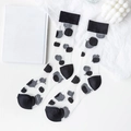Sheer mid-calf socks for women featuring classic black polka dots on white mesh fabric - One Size / Black Polka Dots