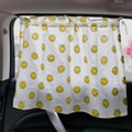 Car window sunshade with yellow smiley pattern on white fabric for baby protection - Smiley Face