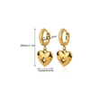 Detail showing 28mm gold heart earrings with zircon inlay and exact measurements - 28mmx12mm